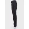 Black trousers with stripes