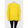 Yellow blouse on rivets