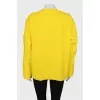 Yellow blouse on rivets