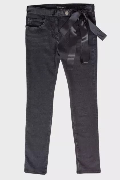 Black jeans with textile belt
