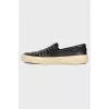 Black slip-on shoes with spikes