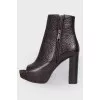 Boots with an open toe