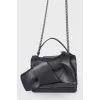 Bag with leather bow