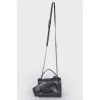 Bag with leather bow