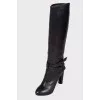 Black high boots on heels