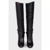 Black high boots on heels