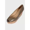 Lacquered wedge heels 