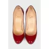 Red patent heel pumps