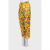 Yellow trousers with a floral print with label