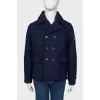 Double-breasted child's overcoat with label