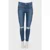 Jeans with decorative cuts