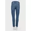 Jeans with decorative cuts