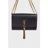 Leather bag with tassel
