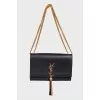 Leather bag with tassel