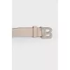 Beige textured leather belt