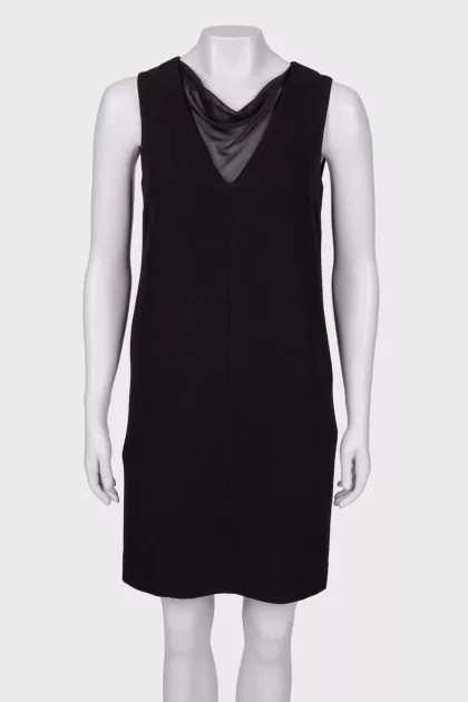Black dress with a translucent insert on the chest