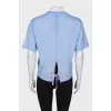 T-shirt with bow and leather inserts on the back