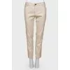 Beige trousers with stripes