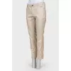 Beige trousers with stripes