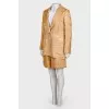 Suit with print in golden color