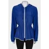 Silk blue jacket with a zipper