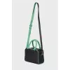 Leather bag with appliqué