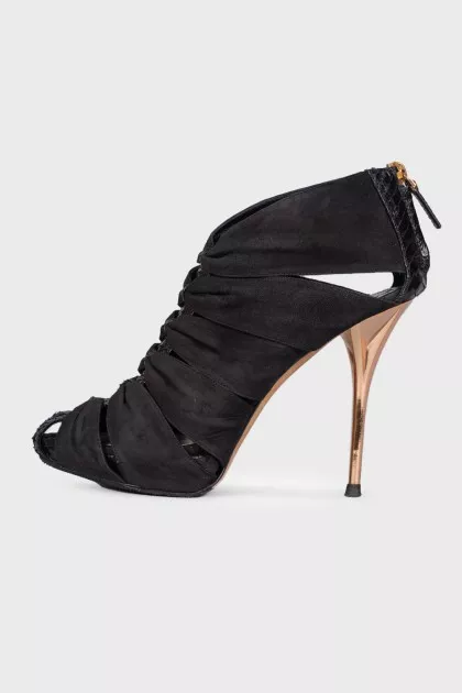 Shoes with golden heels
