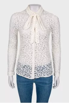 Lace blouse with slogan on the back