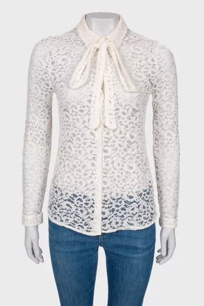 Lace blouse with slogan on the back