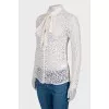 Lace blouse with slogan on the back