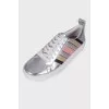 Silver sneakers with stripes