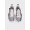 Silver sneakers with stripes
