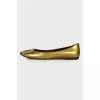Gold leather ballerinas