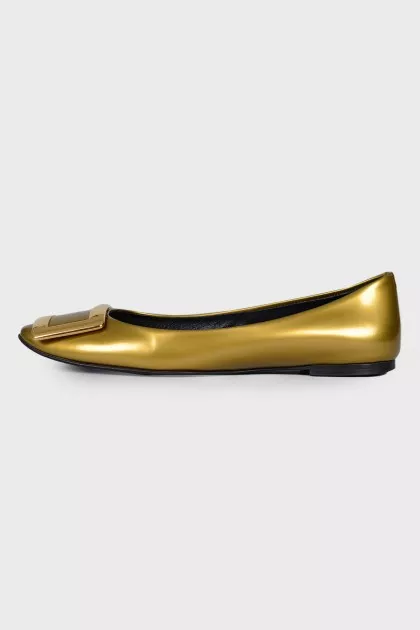 Gold leather ballerinas