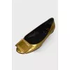 Gold leather ballerinas