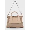 Beige perforated bag