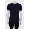 T-shirt with green stripes and tag