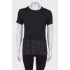 T-shirt with chains at the hem