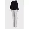Black pleated shorts