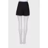 Black pleated shorts