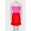 Two-tone dress with ruffles at the hem