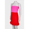 Two-tone dress with ruffles at the hem