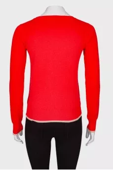 Red jumper with logo
