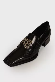 Black loafers with brand logo