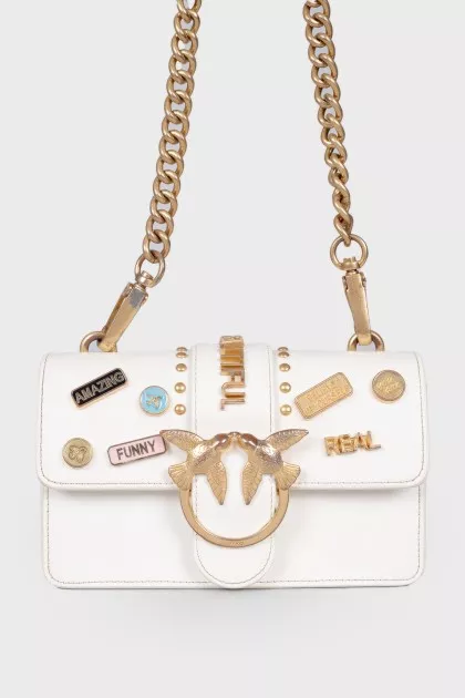 White bag with decorated flap