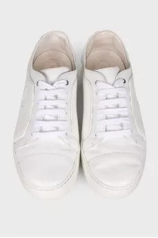 White sneakers with brand logo