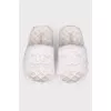 White mules with brand logo