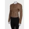 Leather jacket with rhinestones on the sleeves