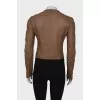 Leather jacket with rhinestones on the sleeves