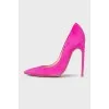 Pink suede pumps